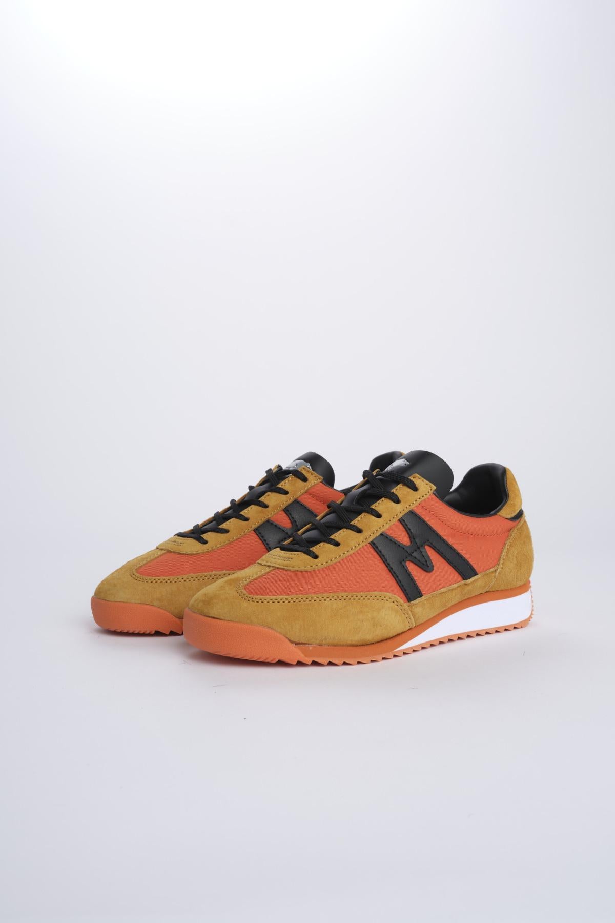 MESTARI TURTLE DOVE MESTARI JAFFA ORANGE BLACK karhu