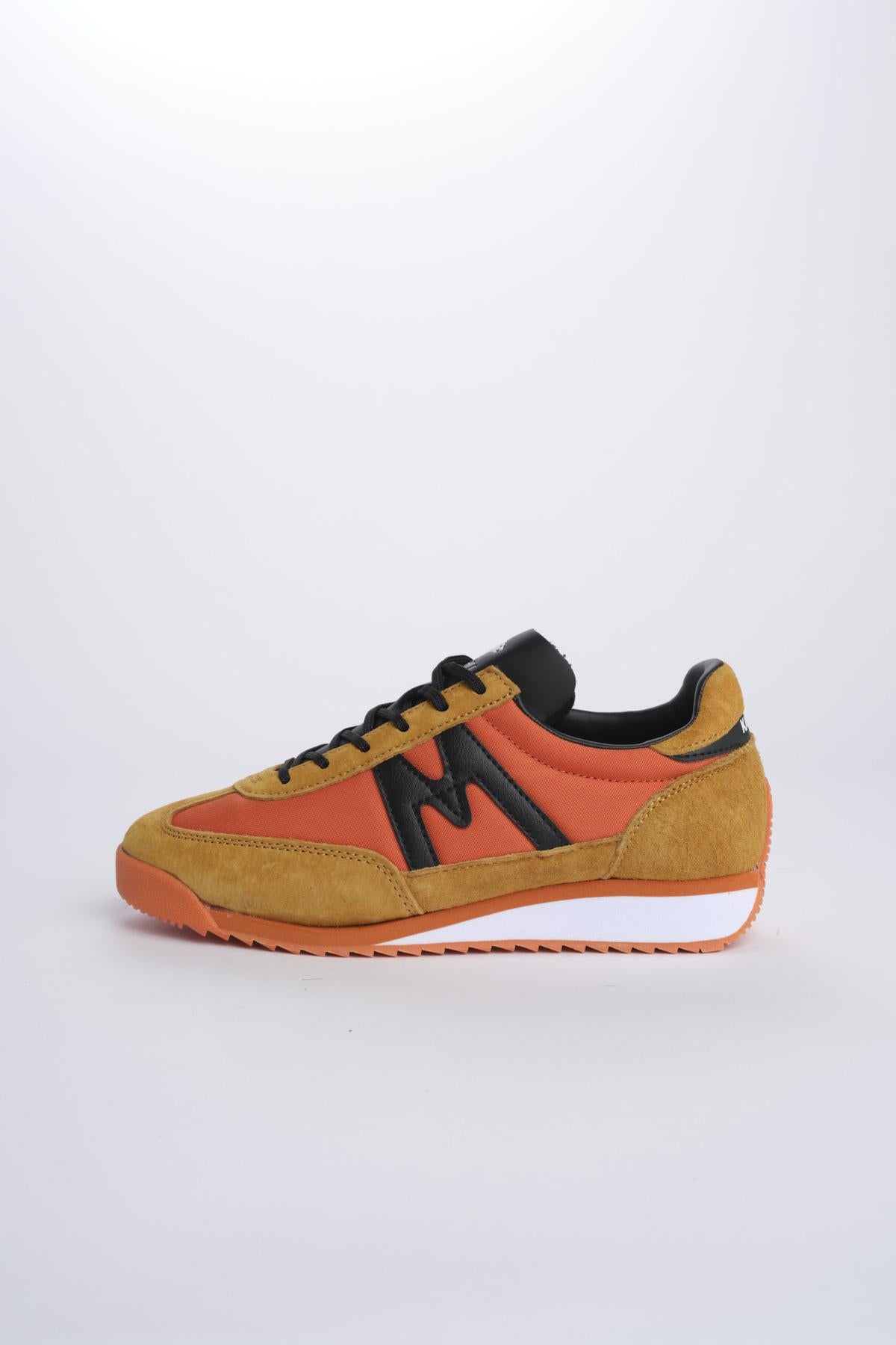MESTARI TURTLE DOVE MESTARI JAFFA ORANGE BLACK karhu