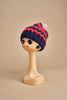 cappello lana a righe con pon pon