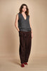 gilet over links