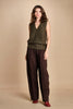 gilet over links