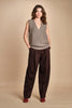 gilet over links