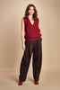 gilet over links