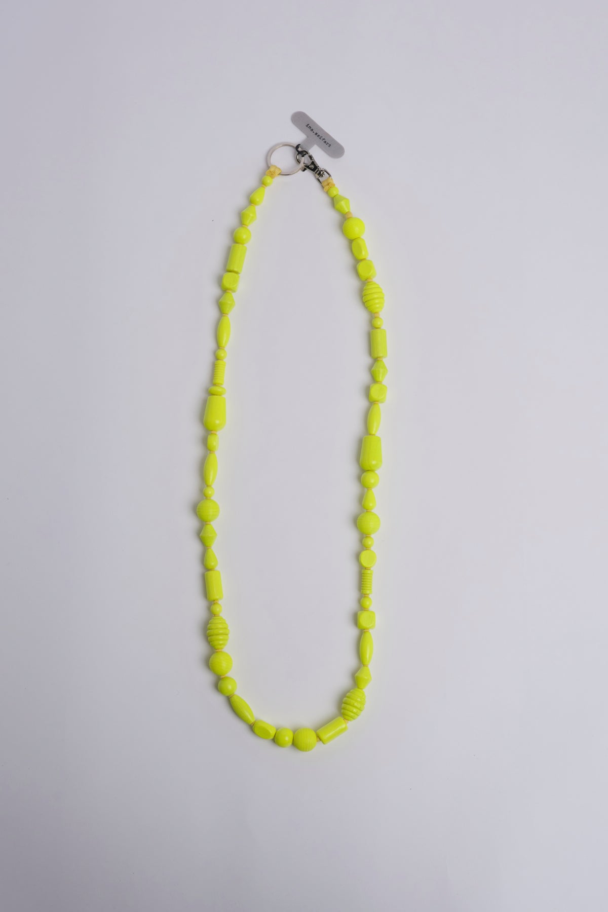 Porta telefono perline PHONENECKLACE NEONYELLOW ina.seifart 