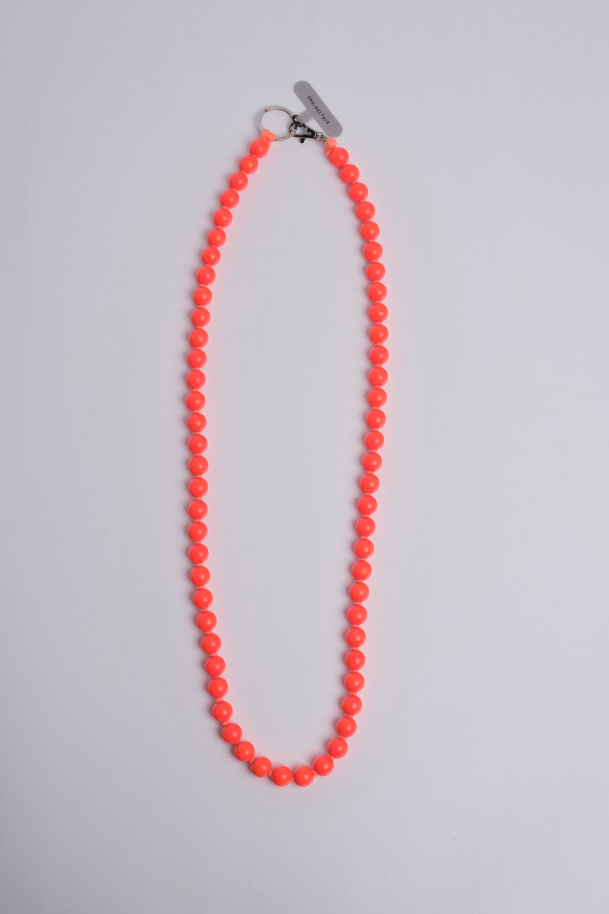 Porta telefono perline rotondo PHONENECKLACE BIG NEONORANGE ina.seifart 