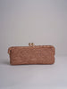 clutch lunga in paglia