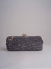 clutch lunga in paglia