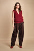 gilet over links