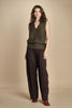 gilet over links