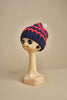 cappello lana a righe con pon pon