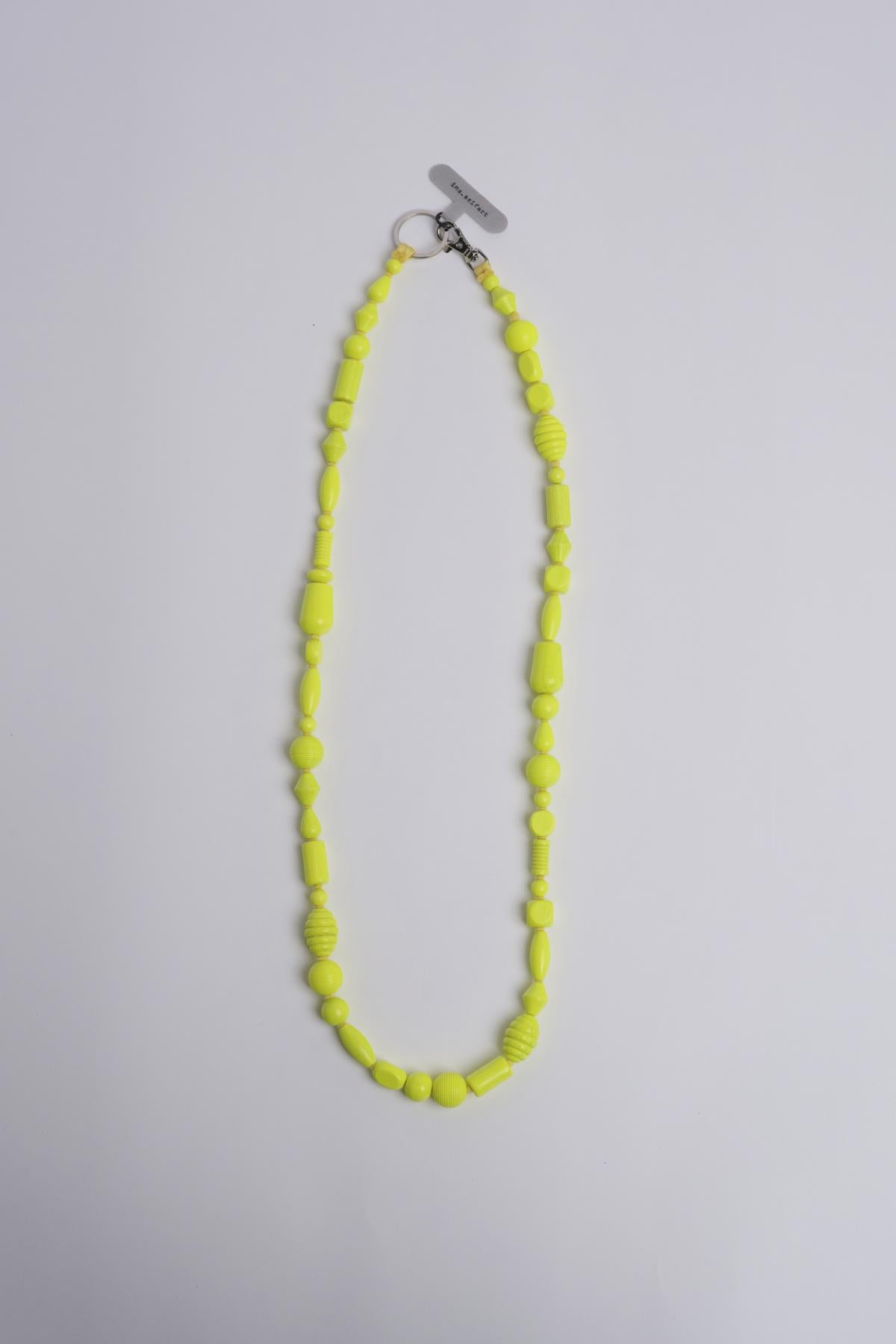 Porta telefono perline PHONENECKLACE NEONYELLOW ina.seifart 