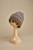 cappello lana a righe con pon pon