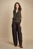 gilet over links