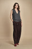gilet over links