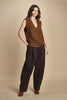 gilet over links