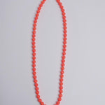 Porta telefono perline rotondo PHONENECKLACE BIG NEONORANGE ina.seifart 