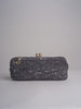 clutch lunga in paglia