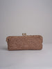 clutch lunga in paglia