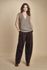 gilet over links